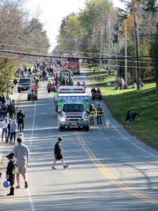 And get this, after they all pass by, tossing candy all the way, they turn around and come back to toss more. Like I said, lots of candy.
